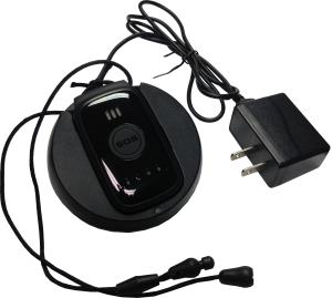 Black GPS tracker sitting in charging cradle